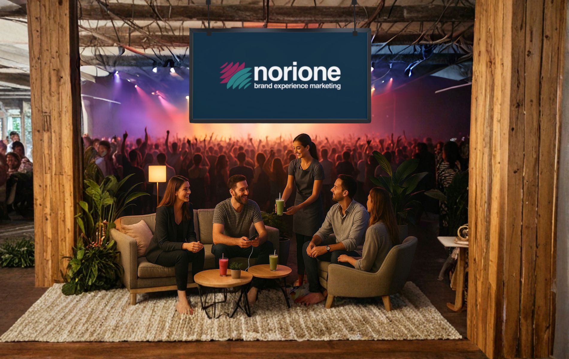 Gruppe Personen sitzen bei einer Veranstaltung gemütlich zusammen und unterhalten sich.